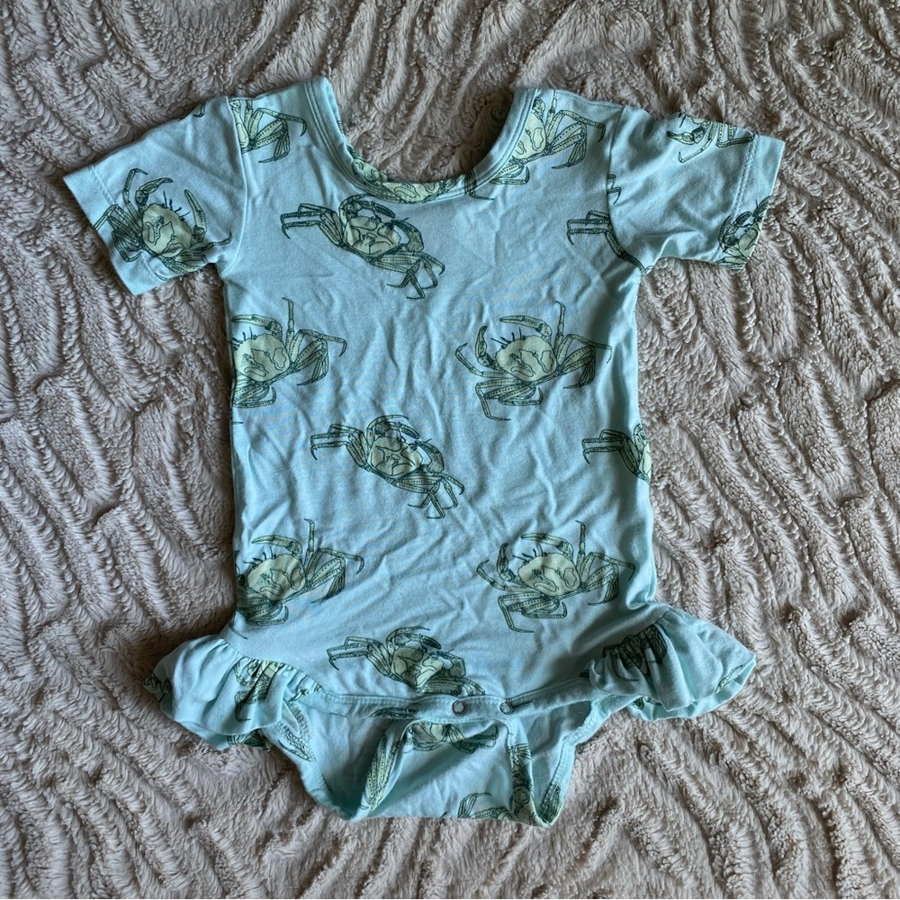 Kate Quinn short sleeve ruffle leg